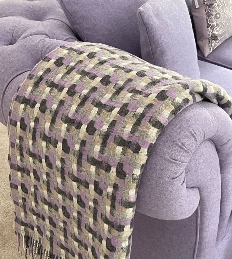 how to put throw on a sofa